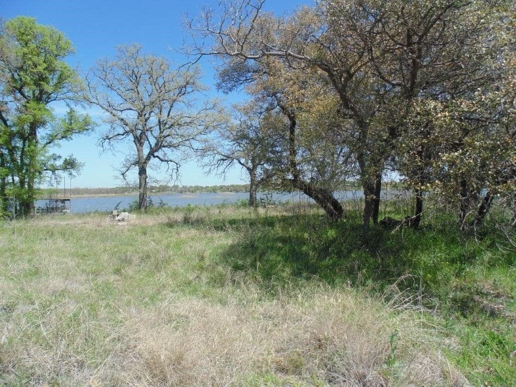 Brown County Texas land with native grass pasture